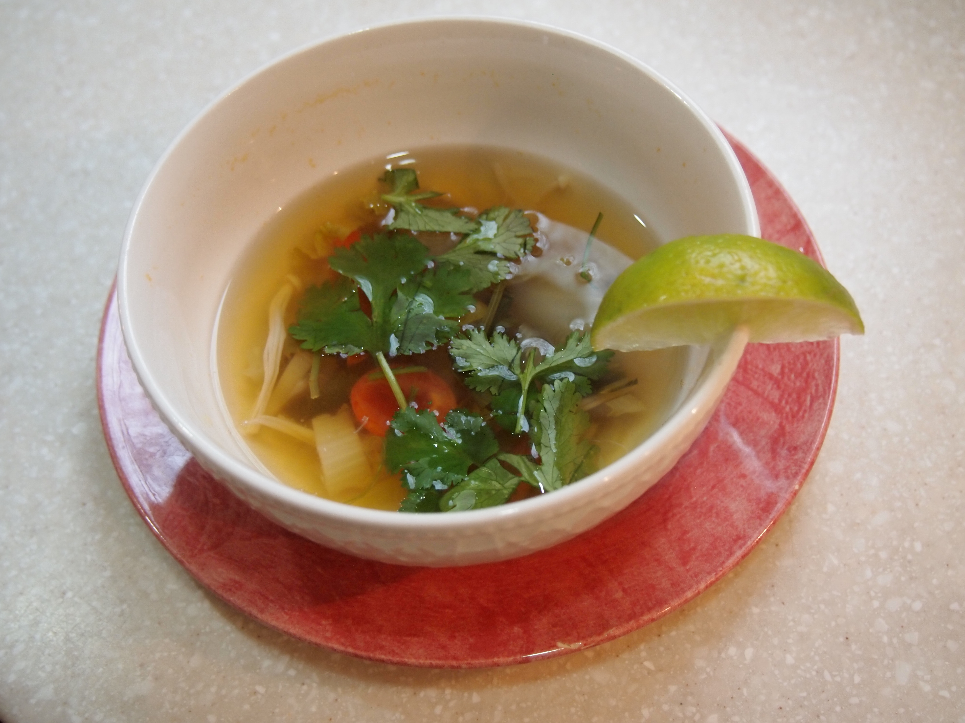 Fridge Surprise Thai Soup with garnish and lime